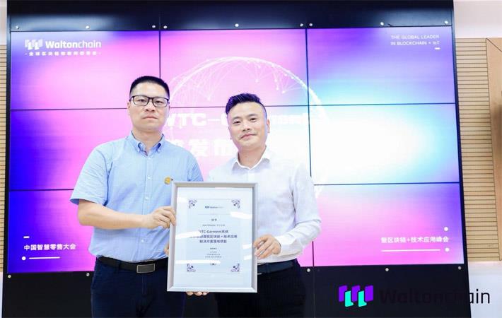 Waltonchain COO Monitor Chan (left) with director of Kaltendin Product Centre, Zhang Zhengxiong. Courtesy: PRNewswire/Waltonchain