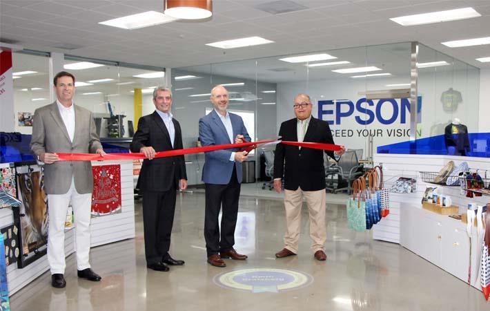 Keith Kratzberg, president and CEO of Epson America at the centre: Courtesy: Epson America 