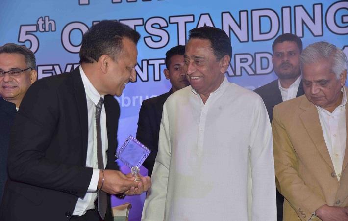 Pratibha Syntex executive director Atul Mittal (left) received the award from Madhya Pradesh chief minister Kamal Nath (centre). Pic: Pratibha Syntex