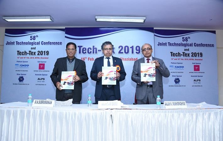 Heads of TRAs (L-R) MN Subramanian (ATIRA), Dr. Arindam Basu (NITRA) and Dr. Anjan K Mukhopadhaya (BTRA) releasing latest publications of NITRA at Tech-Tex 2019 conference.  