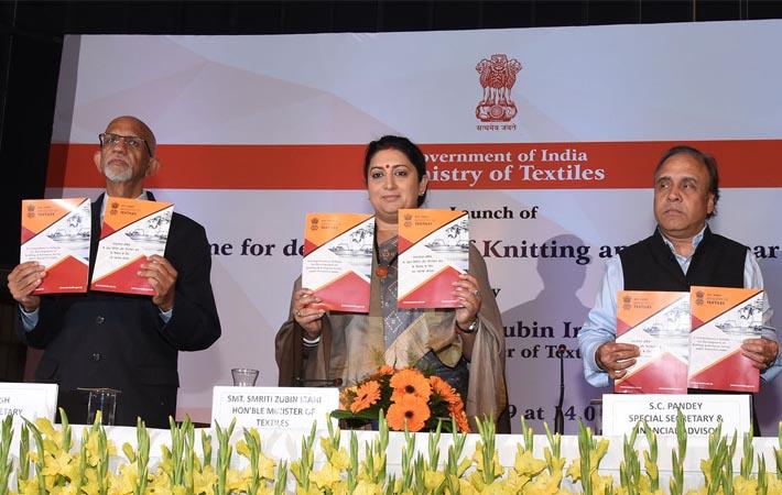 Union textiles minister Smriti Irani releasing the publication at an event to launch the schemes for development of knitting and knitwear sector. Pic: PIB