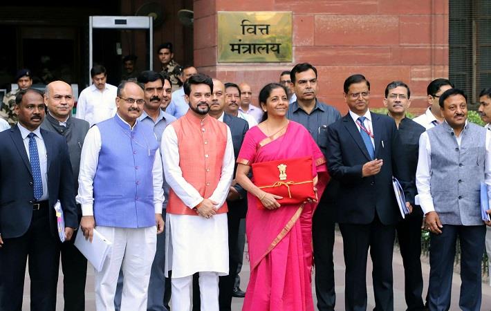 Union finance minister for finance Nirmala Sitharaman along with senior officials before departing from North Block to the Parliament House to present Union Budget 2019-20. Pic: PIB