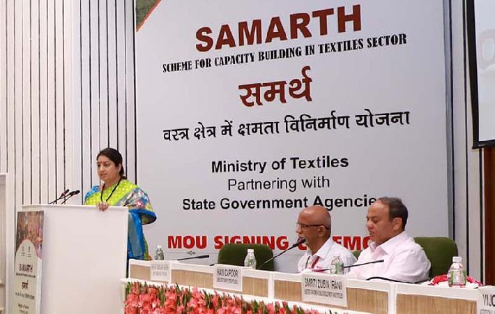 Union textiles minister Smriti Irani addressing at the MoU signing ceremony of her ministry with 18 state governments to provide skill training under 
