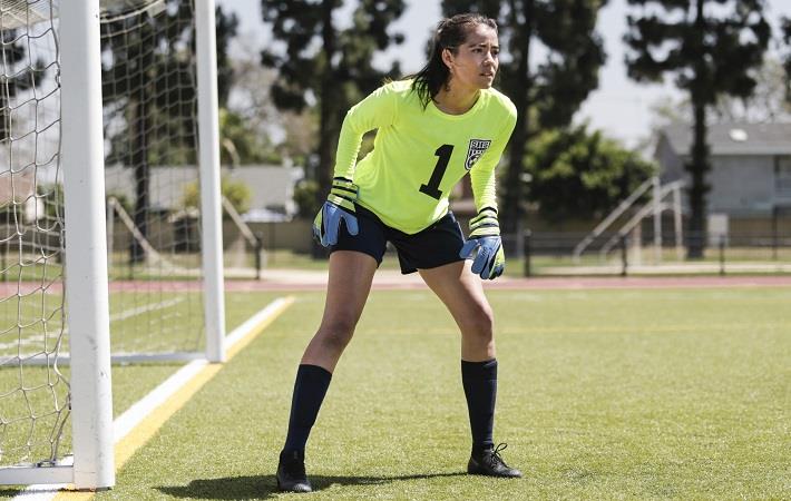 Soccer goalie preparing to stop a shot while wearing a decorated jersey from A4. Pic: A4