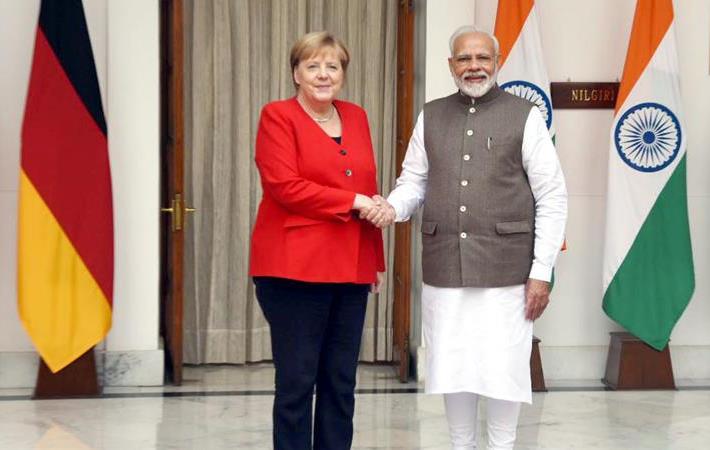 Indian Prime Minister Narendra Modi (right) with German Chancellor Dr. Angela Merkel, at Hyderabad House, in New Delhi. Pic: PIB