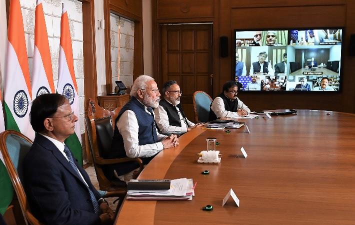 PM Narendra Modi interacting with the industry representatives via video conference. Pic: PIB