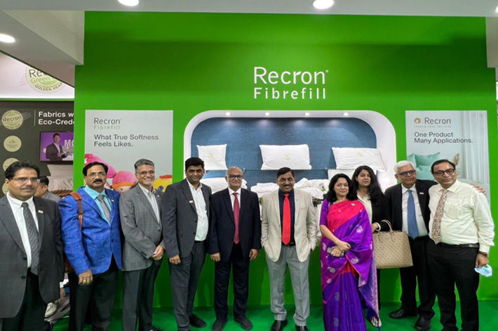 U.P. Singh, Secretary, Ministry of Textile (in red tie) is seen with RIL, SRTEPC, TEXPROCIL and Invest India officials at the RIL booth at Heimtextil Frankfurt Exhibition. Pic: RIL